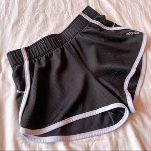 Black and white Reebok athletic shorts